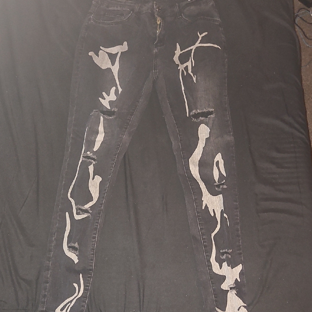 Black Skinny Jeans with Distressed Details